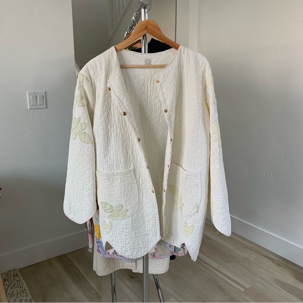 Women's Cream Quilted Jacket with snap closure